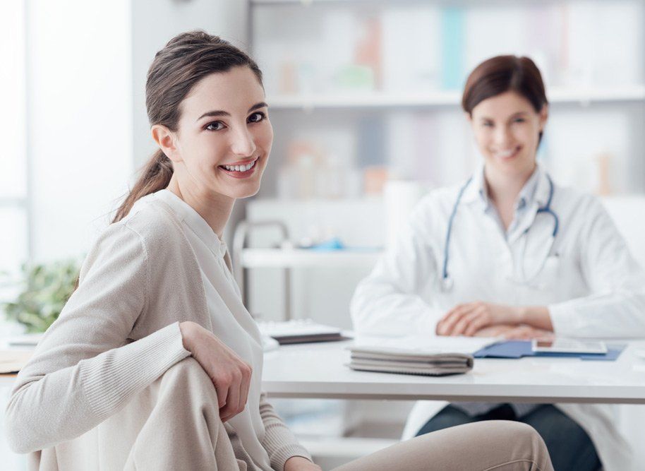 Smiling Patient Receiving A Medical Consultation — Deception Bay Doctors In Deception Bay, QLD