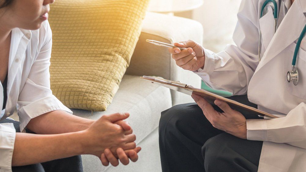 Psychiatrist Doctor Consulting And Having Diagnostic Examination On Woman Patient's Health Depression — Deception Bay Doctors In Deception Bay, QLD