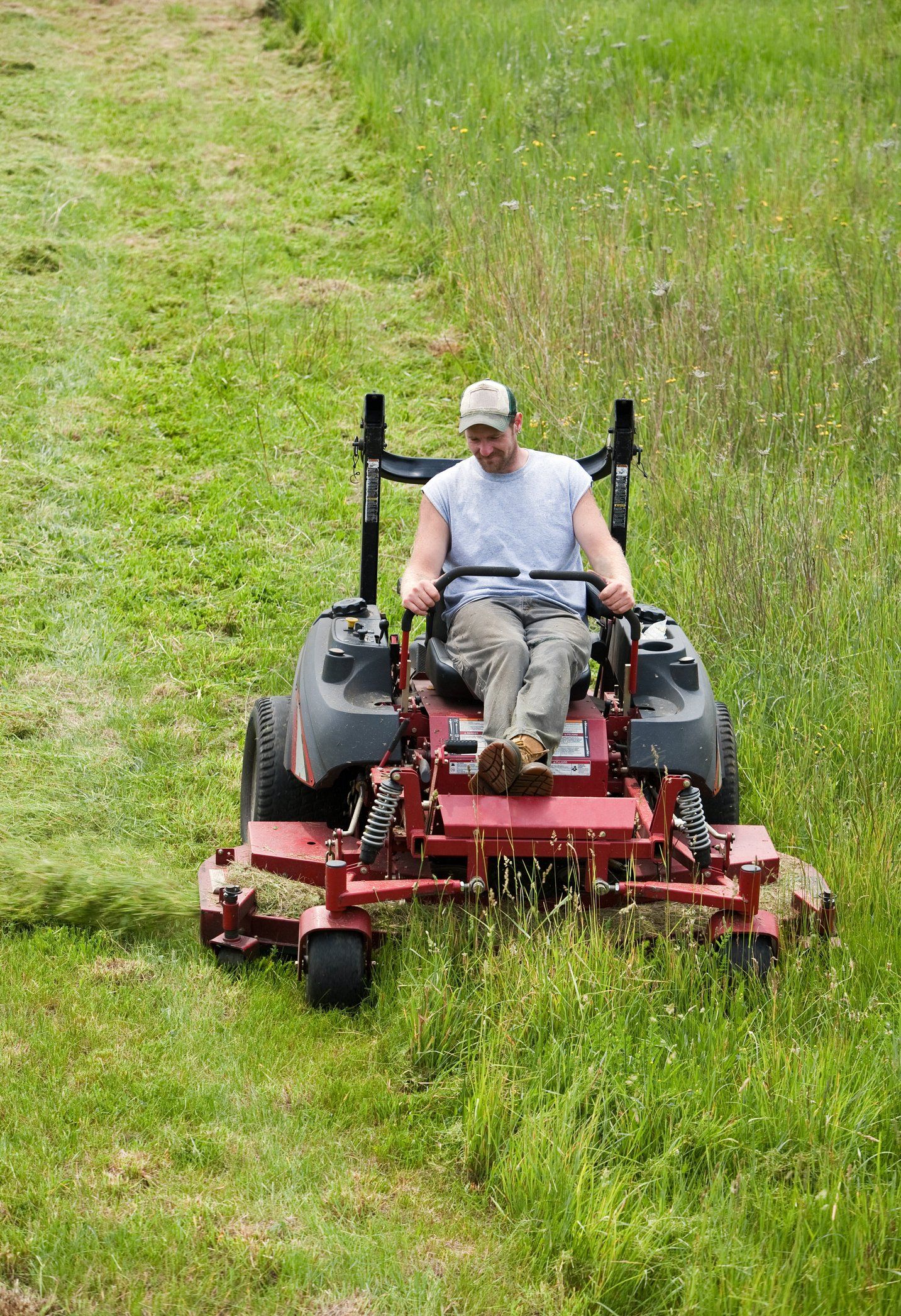 mowing long grass