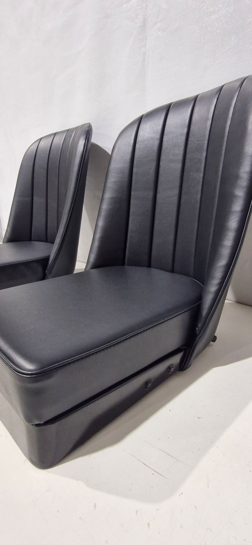 Black car seat with red stitching, in a red car interior — Tidy Trim Newcastle in Carrington, NSW