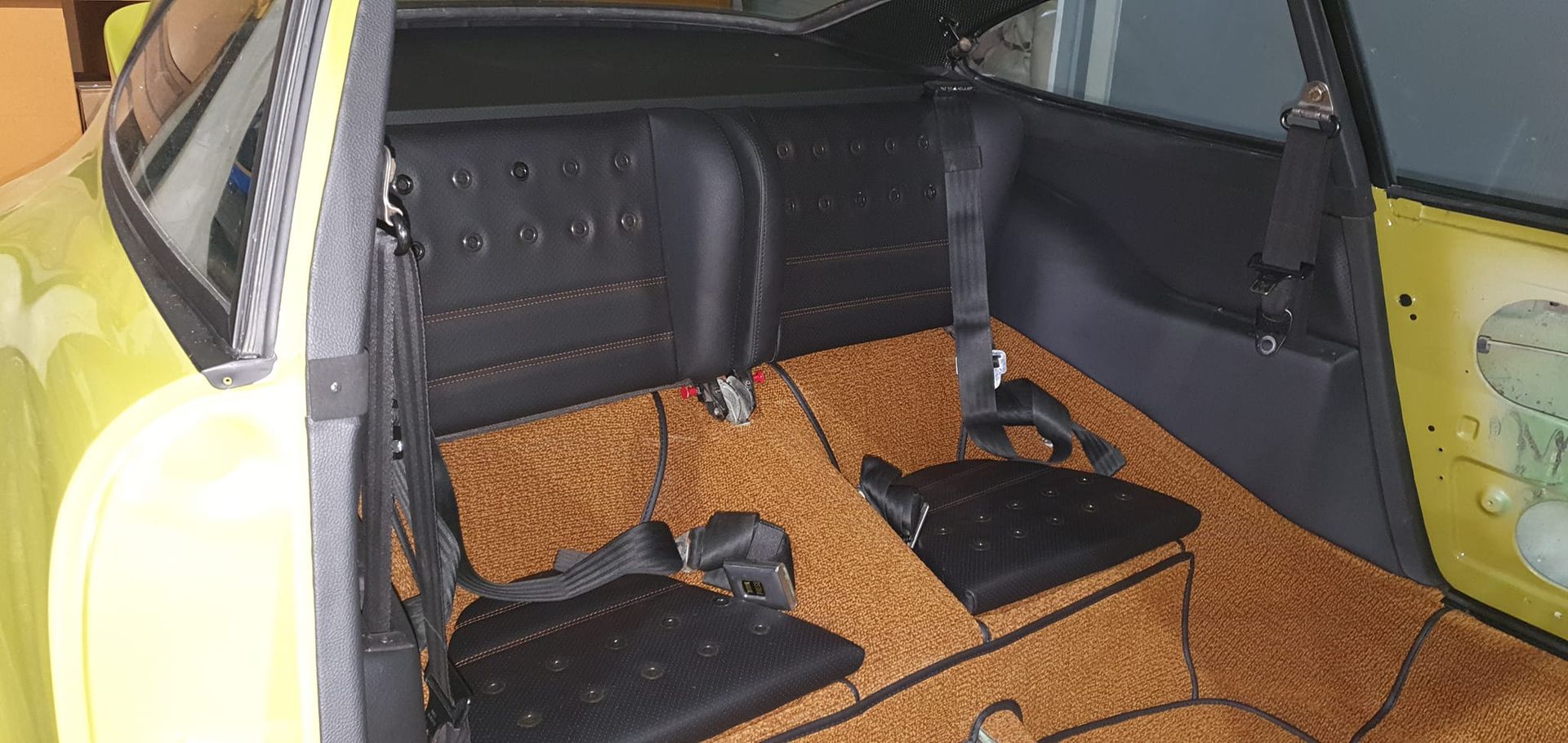 Turquoise custom van with purple velvet interior, side doors open — Tidy Trim Newcastle in Carrington, NSW