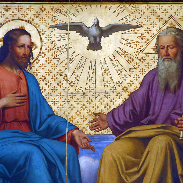 Three religious figures under a dove of the Holy Spirit in a gold Byzantine-style icon.