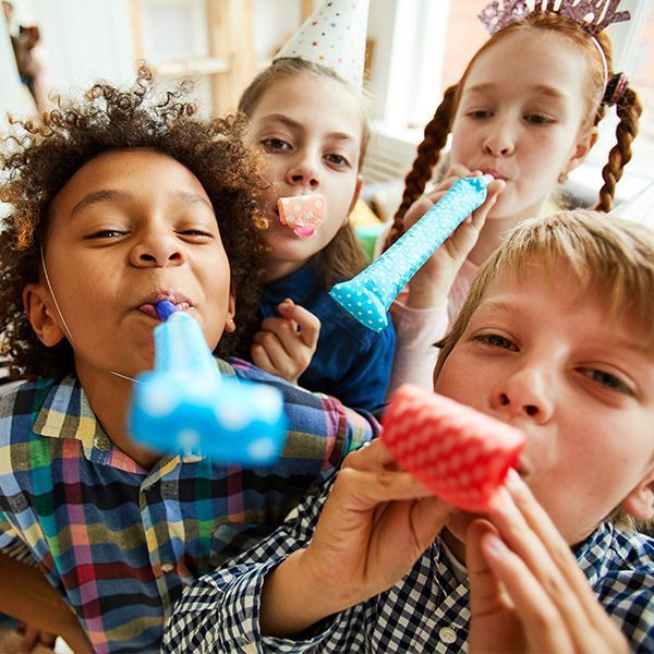 Image for blog post January 17, 2025: three kids eating pizza at a birthday party. 