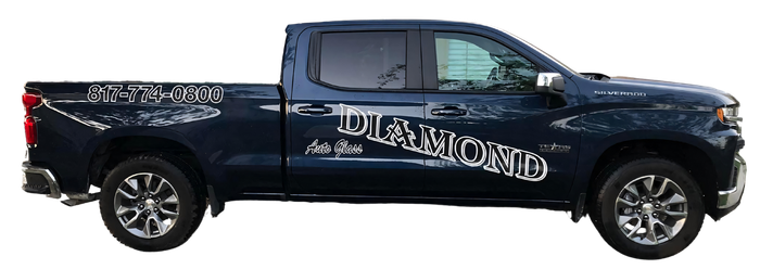 A blue truck with the word diamond on the side of it.