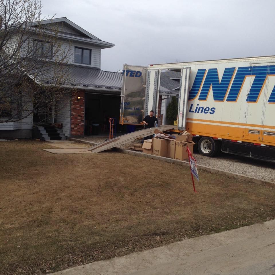 A truck is parked in front of a house