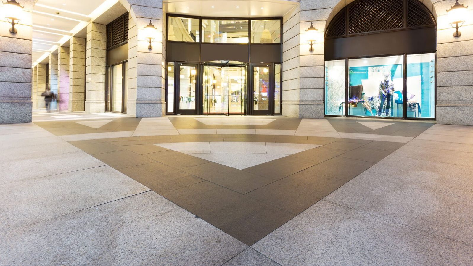 A large building with a triangle pattern on the floor