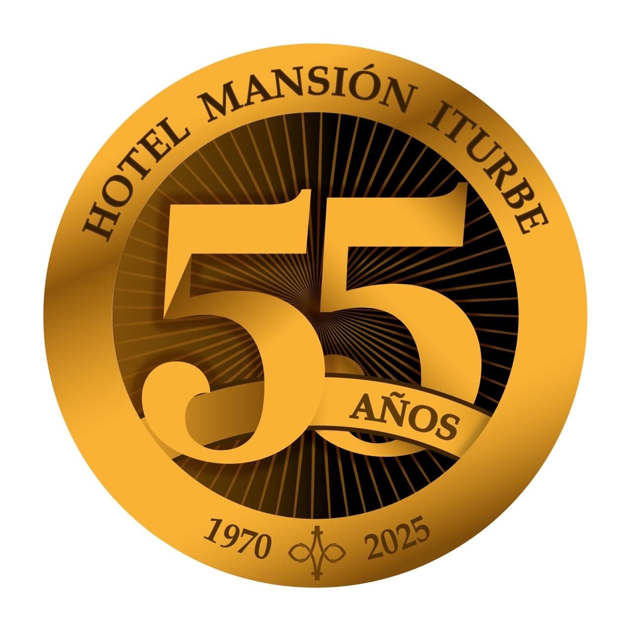 Gold circular logo for Hotel Mansión Iturbe, celebrating 55 years with 