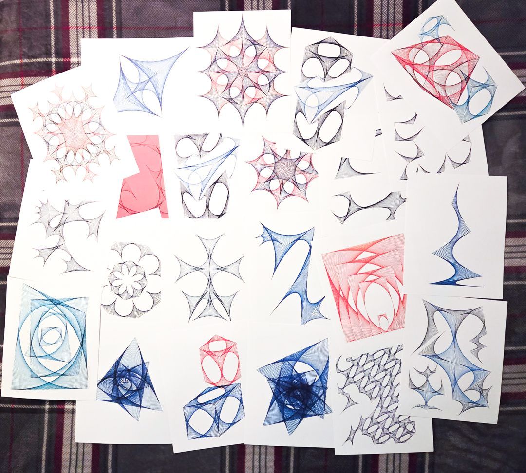 Collection of Fleetis Originals artwork on mini posters spread about