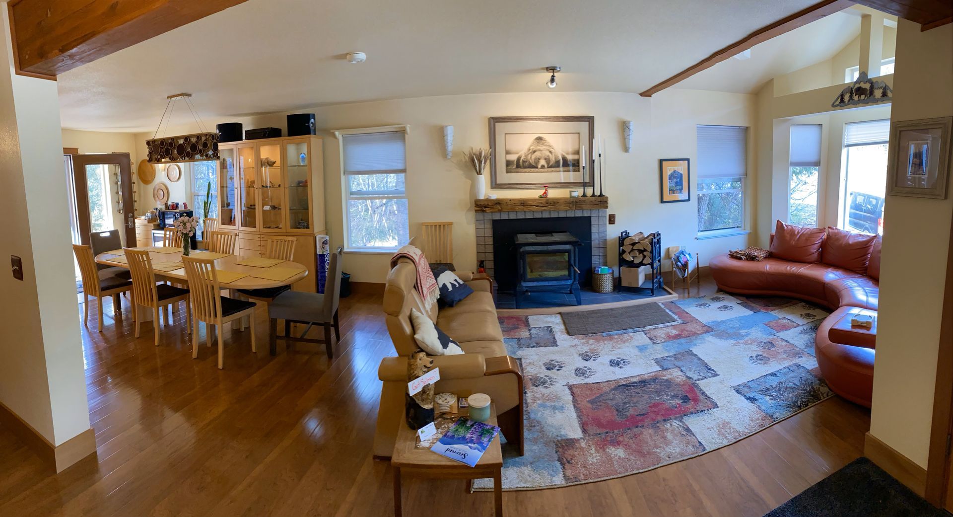 A living room filled with furniture and a fireplace.