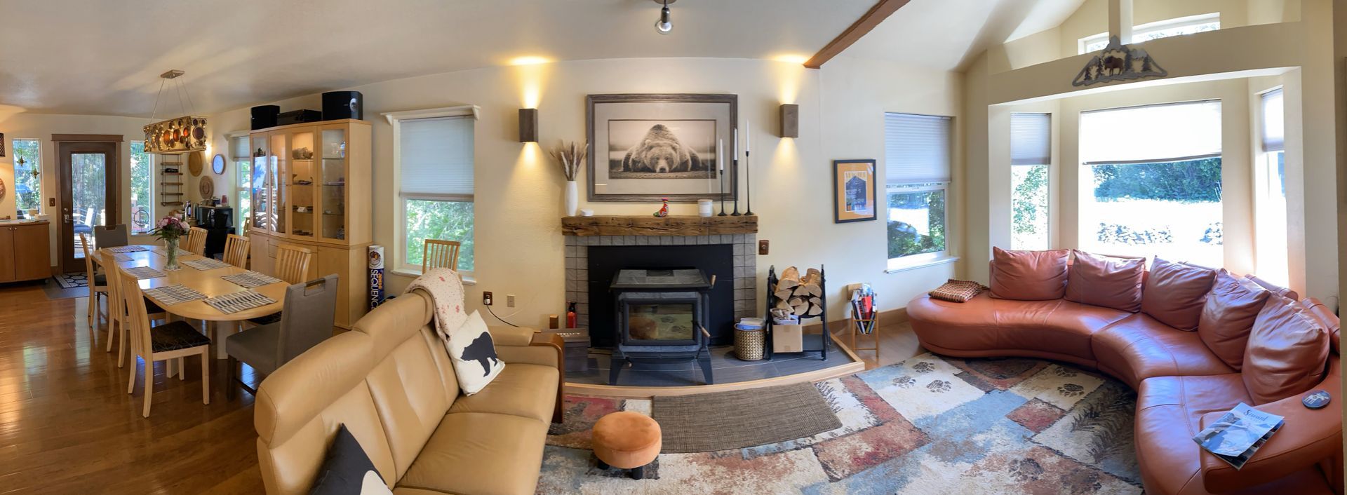 A living room filled with furniture and a fireplace.