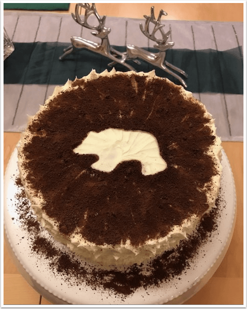 A cake with a picture of a bear on it