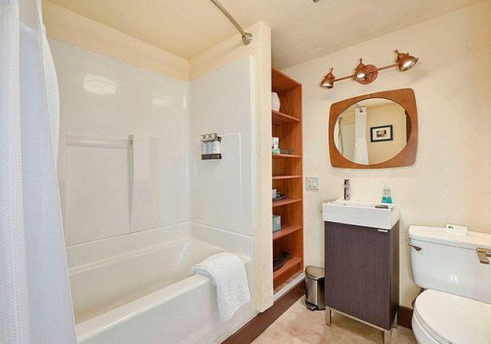 Mt. Benson Suite 1 bedroom suite in Bell In The Woods B&B in Alaska. Private bathroom with bathtub.