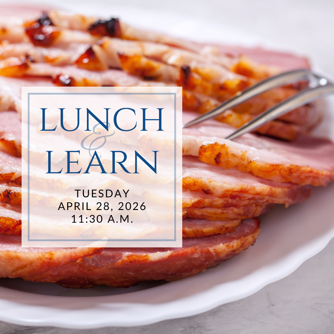 a plate of sandwiches on a table with the words lunch & learn on it