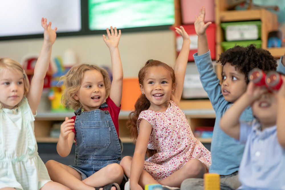 Children Raising Their Hands — Cheyenne, WY — I Am A Promise Daycare