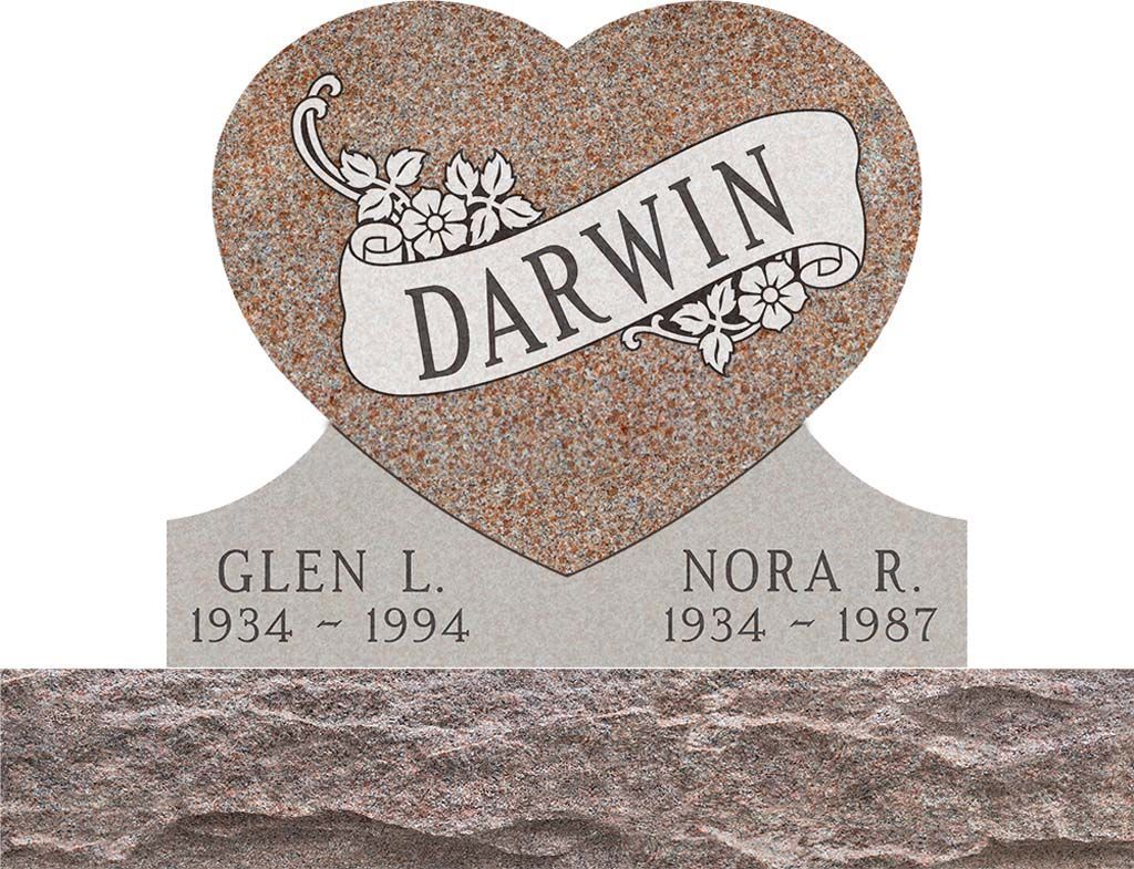 Gravestone with heart-shaped stone reading DARWIN and names Glen L. and Nora R. with dates