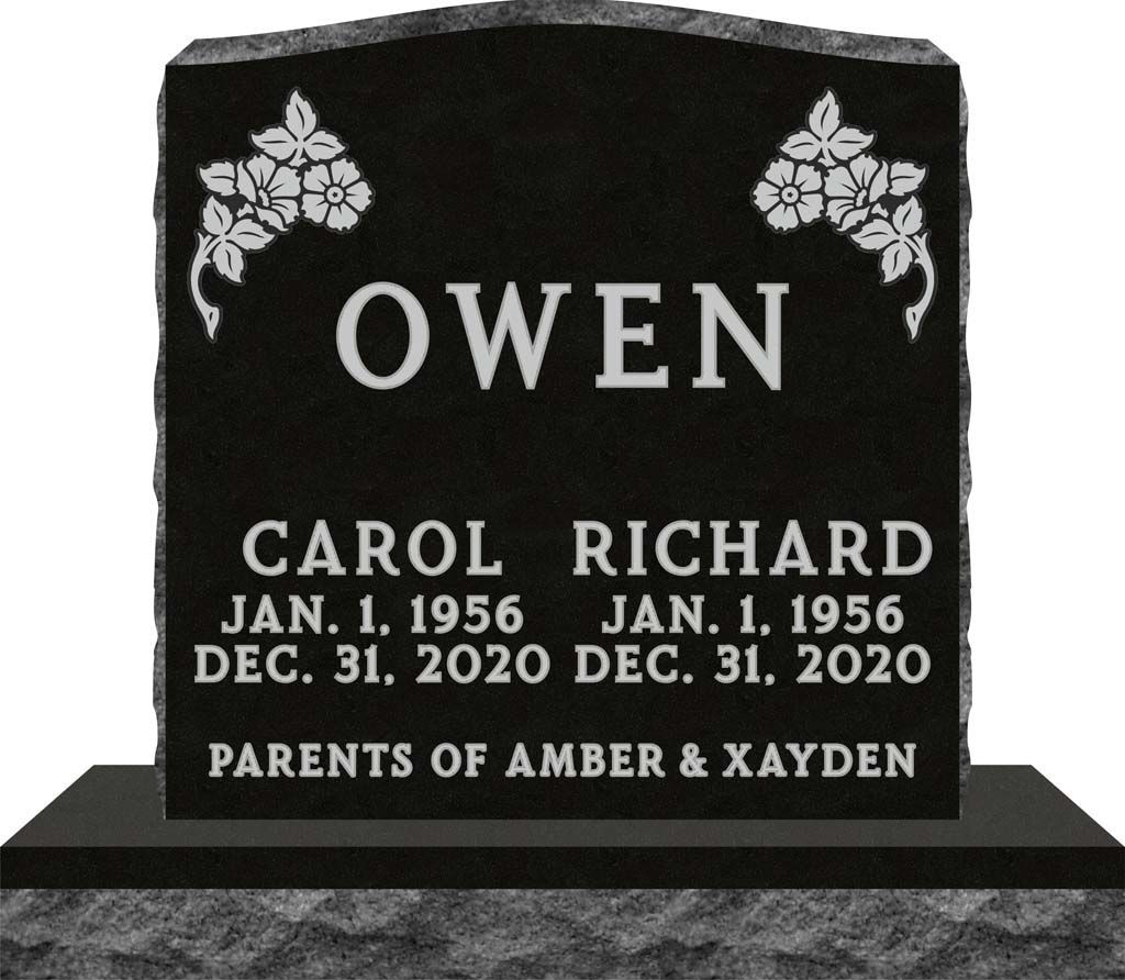 Black granite memorial plaque engraved with OWEN, Carol and Richard, with floral corners.