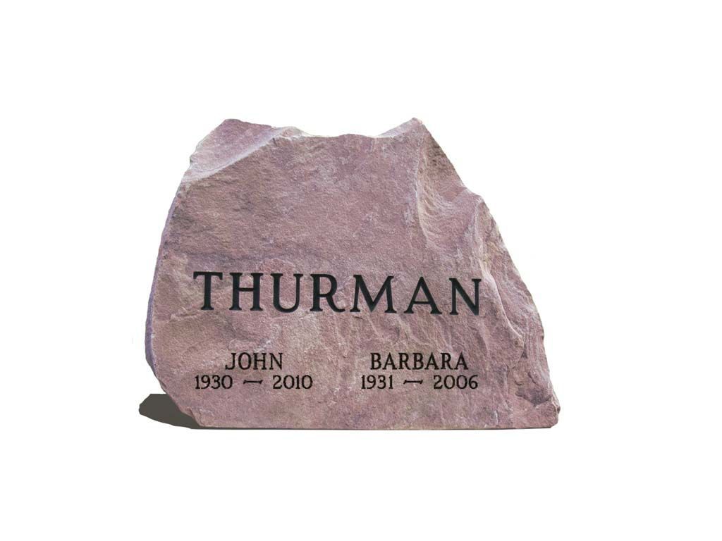 Gray gravestone for Thurman and Barbara, with birth and death years engraved.