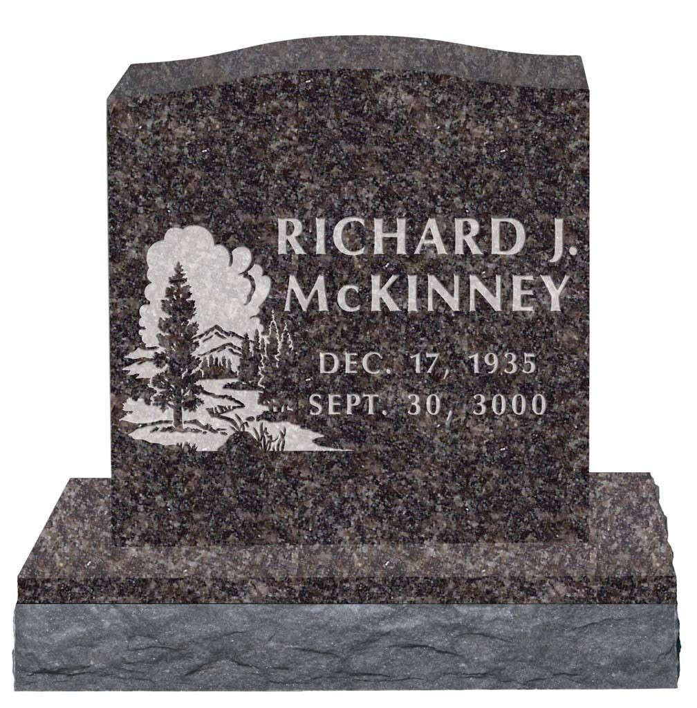 Dark granite gravestone for Richard J. McKinney with engraved tree and dates.
