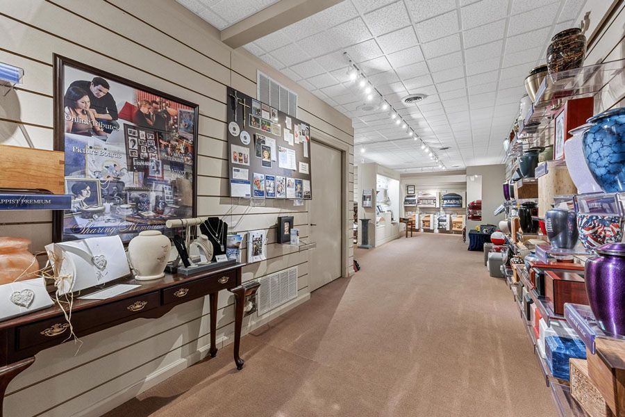 A long hallway filled with lots of items in a store.