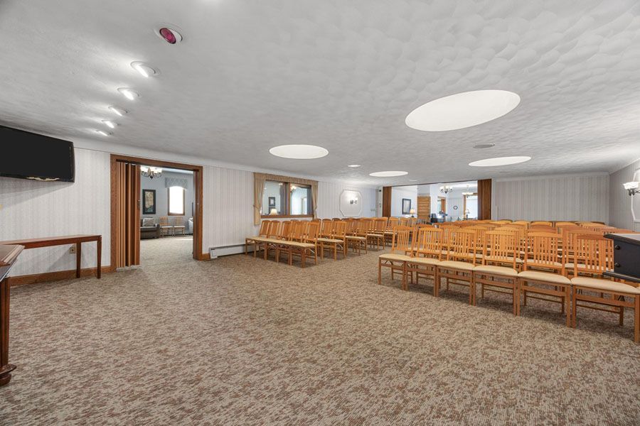 A large room with a lot of chairs in it.