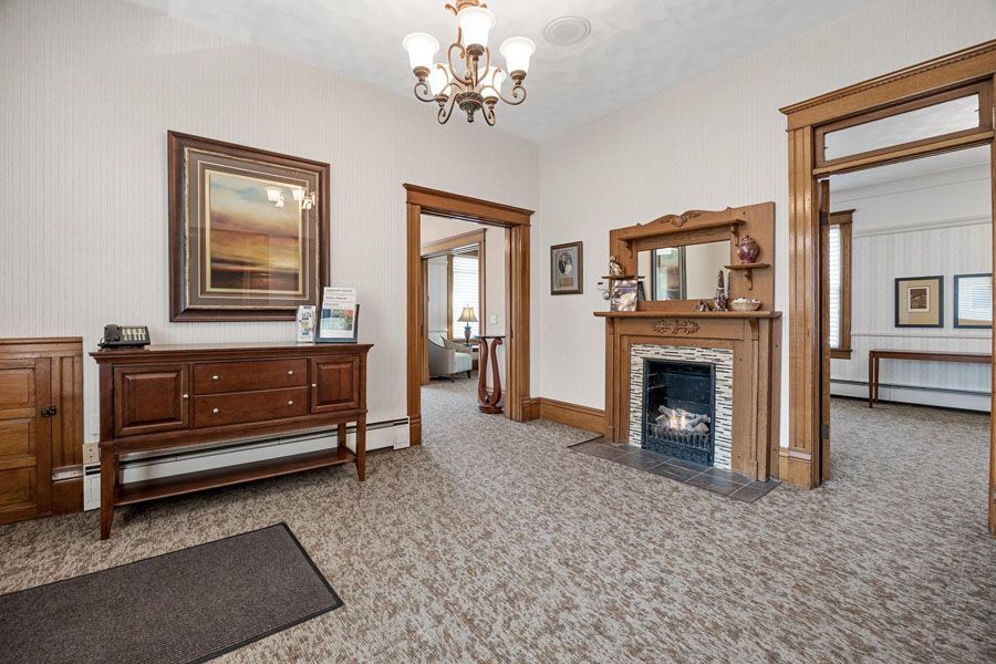 There is a fireplace in the middle of the room.