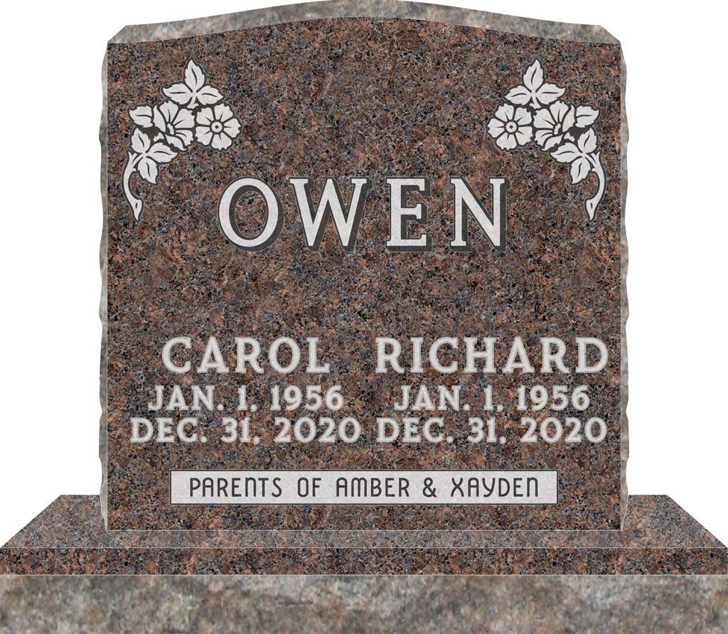 Brown granite memorial headstone engraved “OWEN” with names Carol and Richard and floral carvings