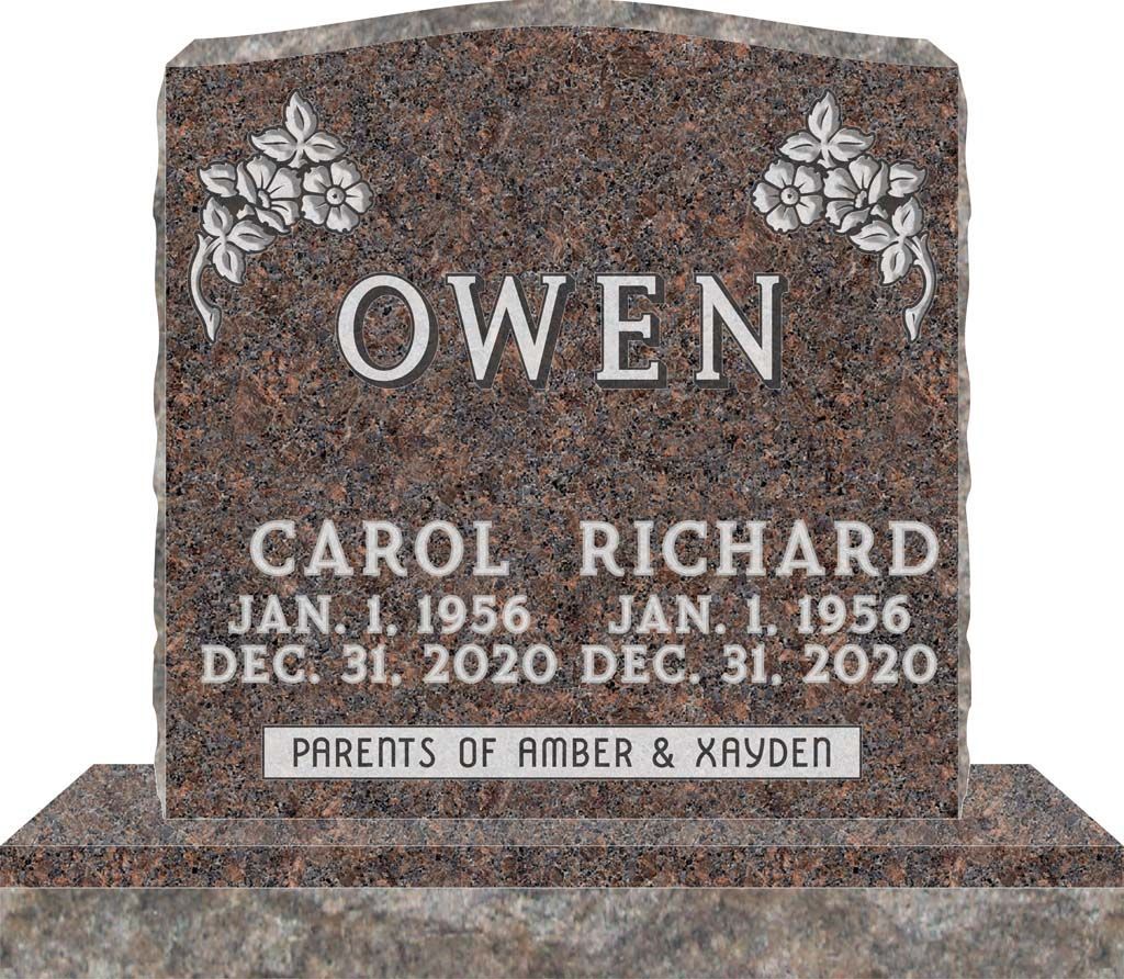Gray granite gravestone with floral carvings, engraved OWE N and memorial dates for Carol and Richard Owen.