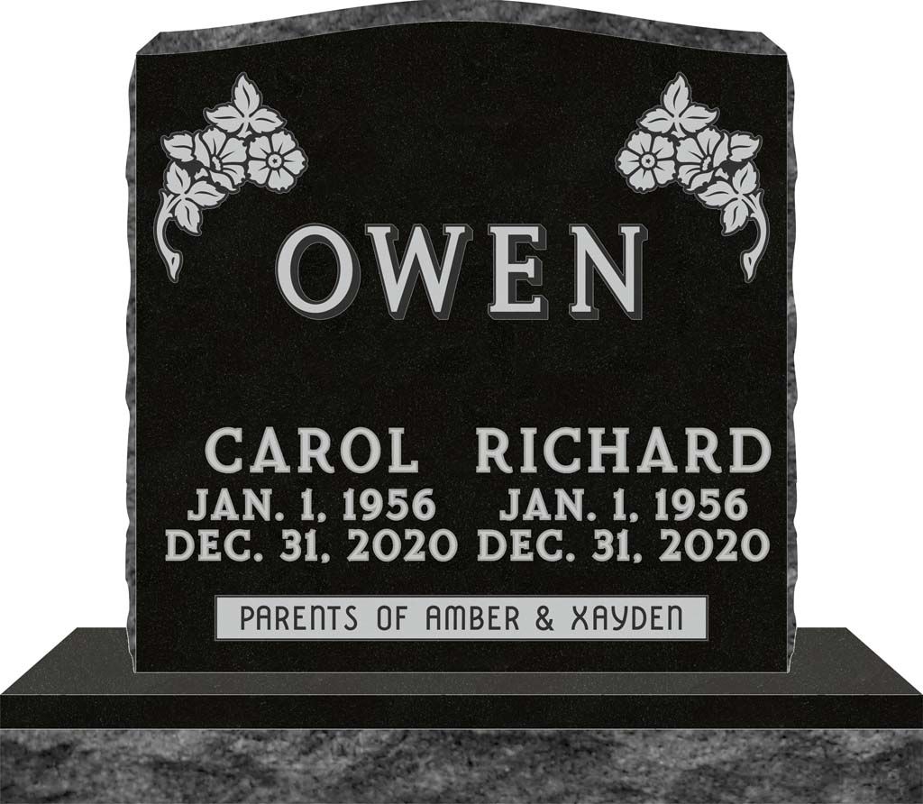 Black memorial gravestone for Owen, Carol, and Richard with floral carvings and dates engraved.