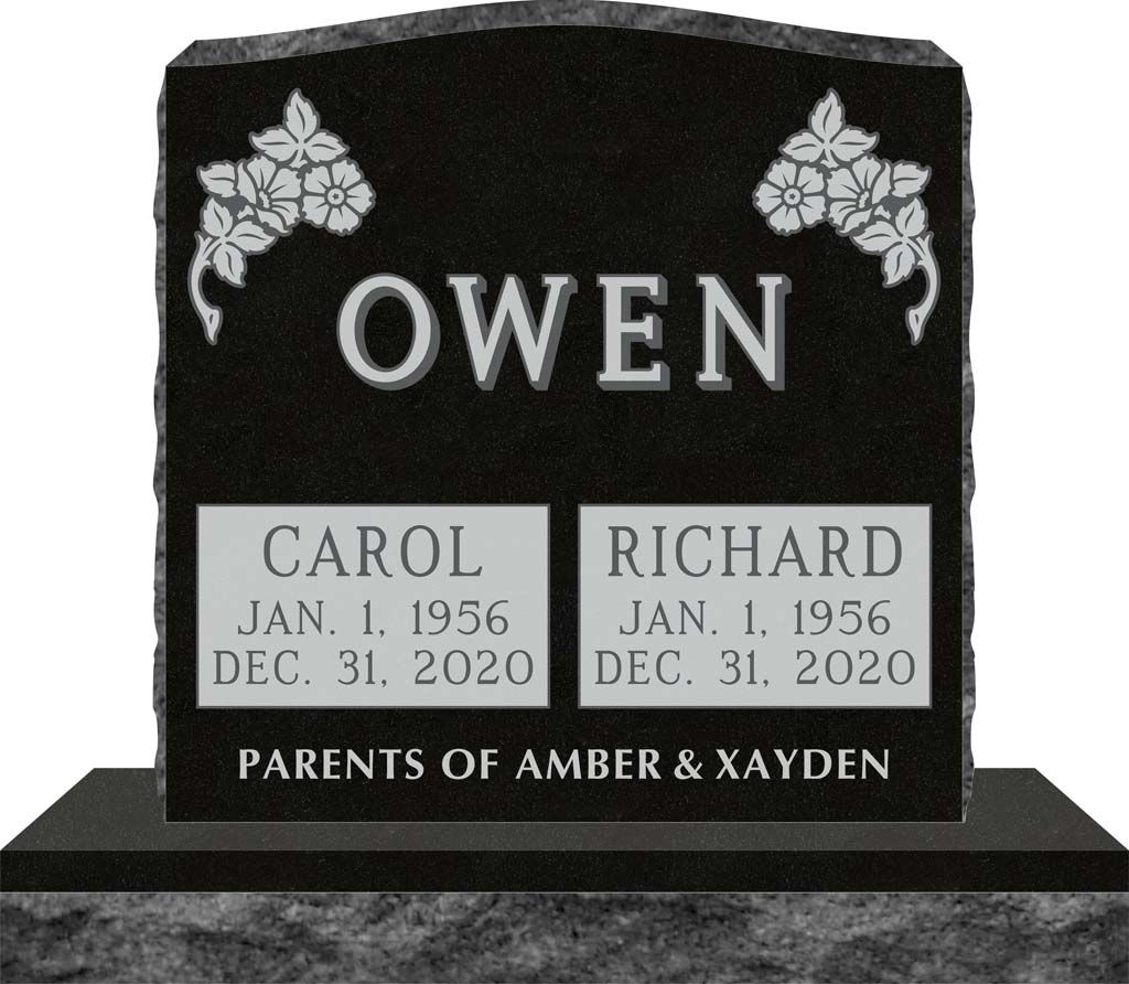Black memorial headstone for Owen with Carol and Richard plaques and floral carvings.