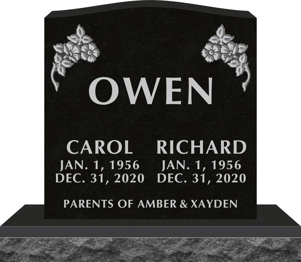 Black memorial headstone engraved “OWEN” with names Carol and Richard and dates, with floral corners