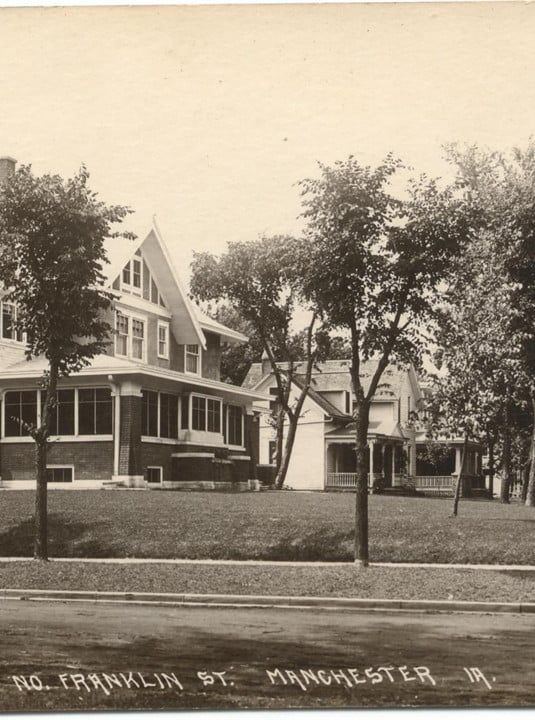 A black and white photo of a house on franklin street in manchester