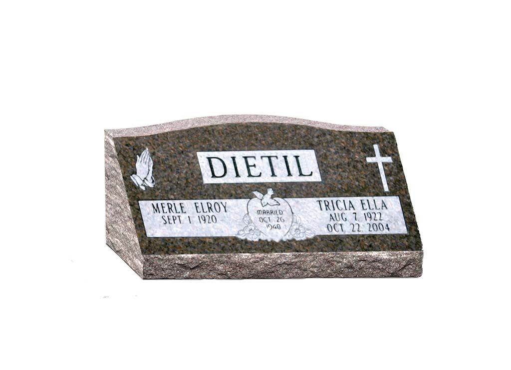 Dark gravestone with the name 