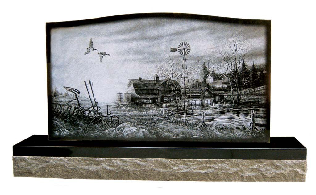 Black and white landscape scene on a decorative stone plaque with a black base