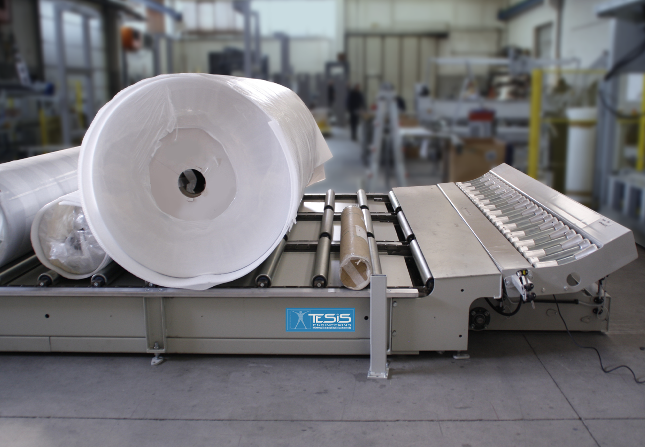Custom engineered handling line for rolls of plastic fabric, rolls reels and coils handling equipment