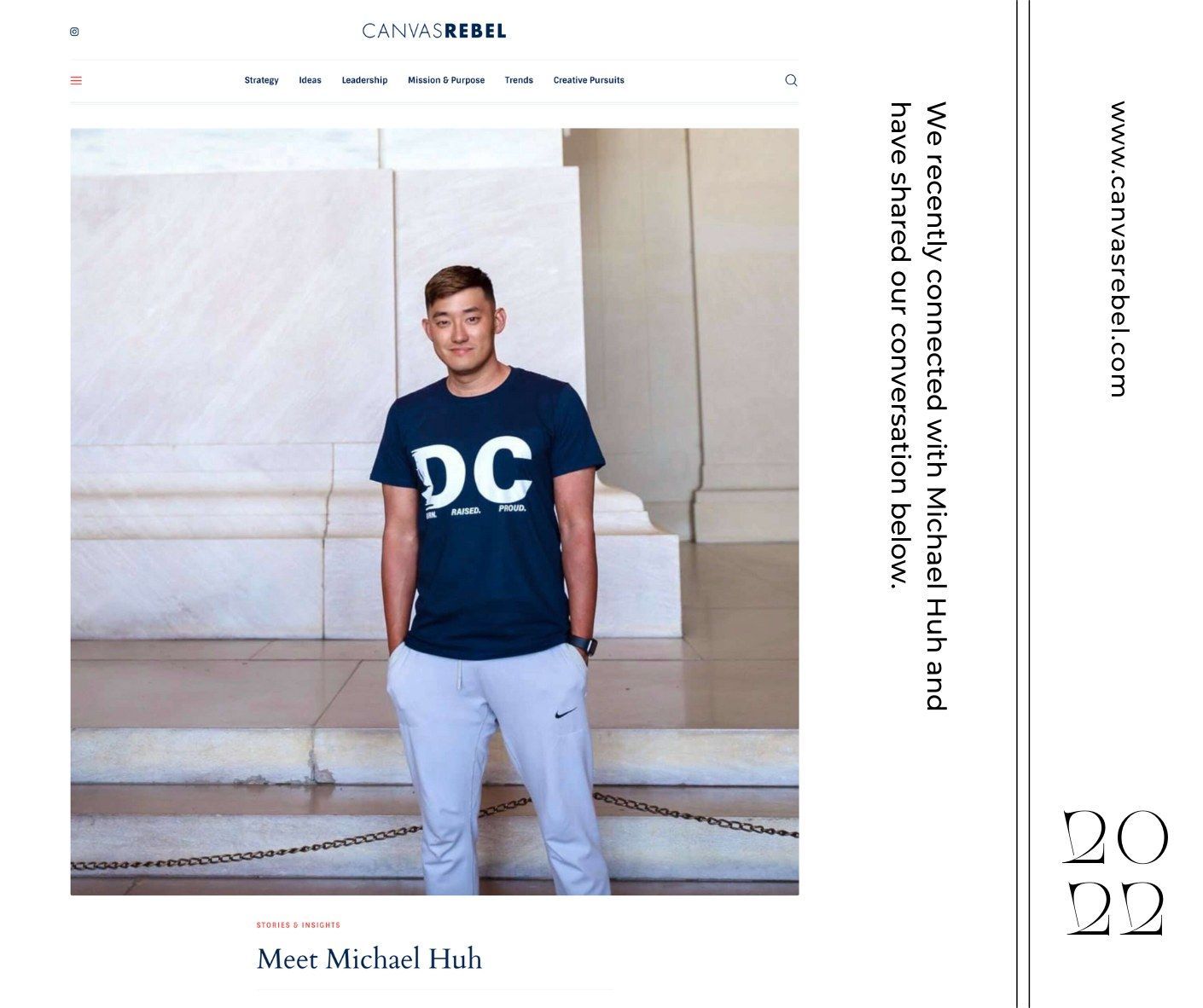 A man wearing a blue shirt with the letter dc on it