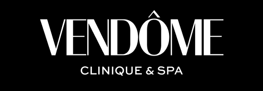 A black and white logo for vendome clinique & spa