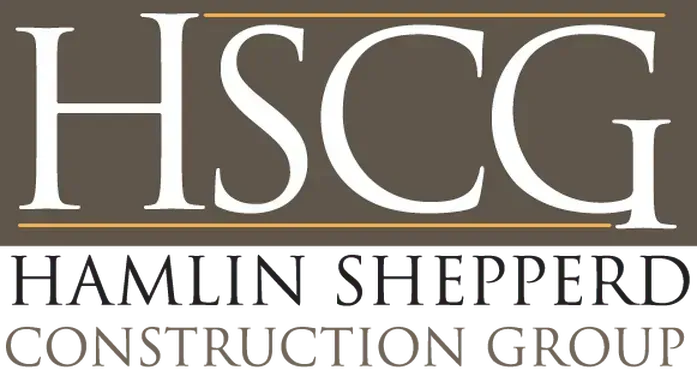 The hamlin shepperd construction group logo is brown and white
