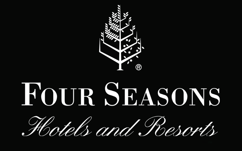 A black and white logo for four seasons hotels and resorts