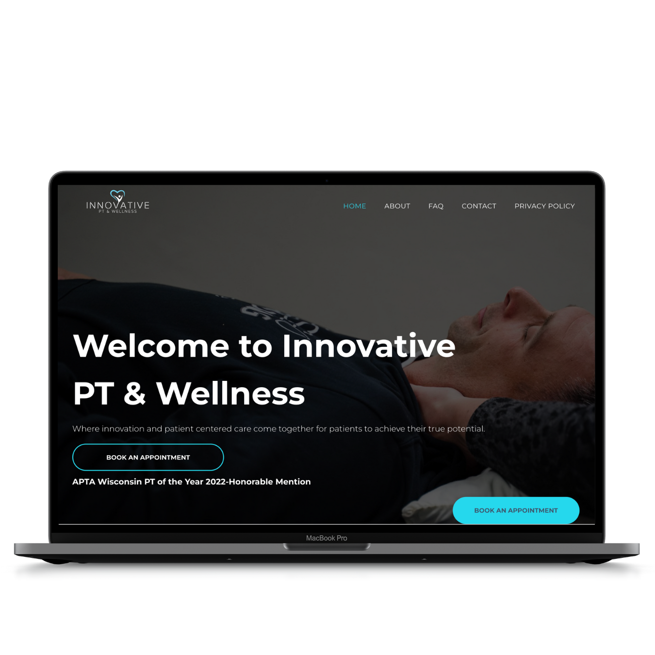 A laptop computer is open to a website for innovative pt & wellness.