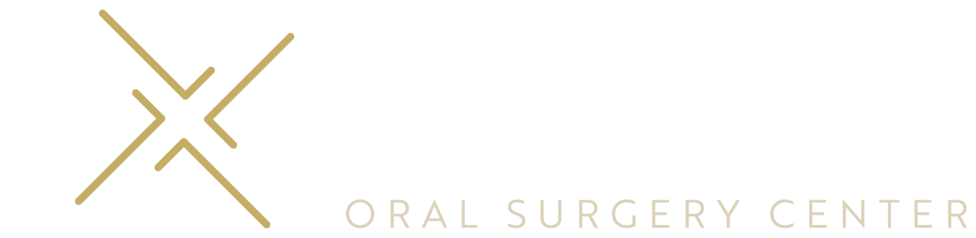 A logo for the oral surgery center with a gold x on a white background.