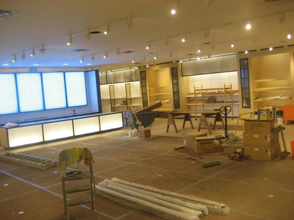 A large room with a lot of boxes on the floor