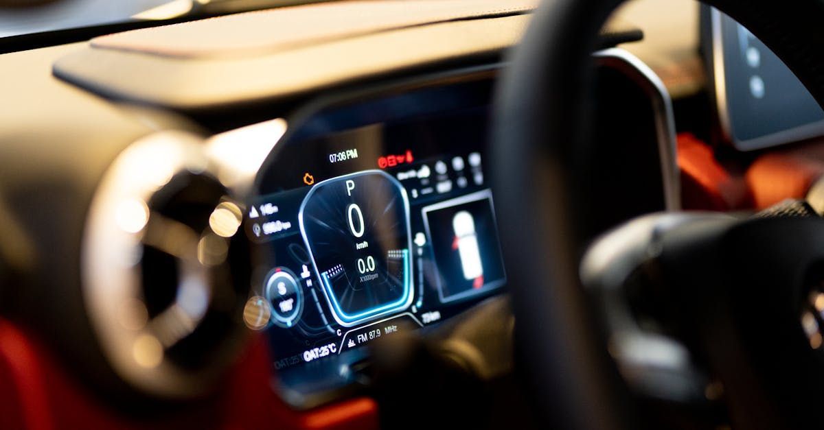 A close up of a car dashboard with a digital display.