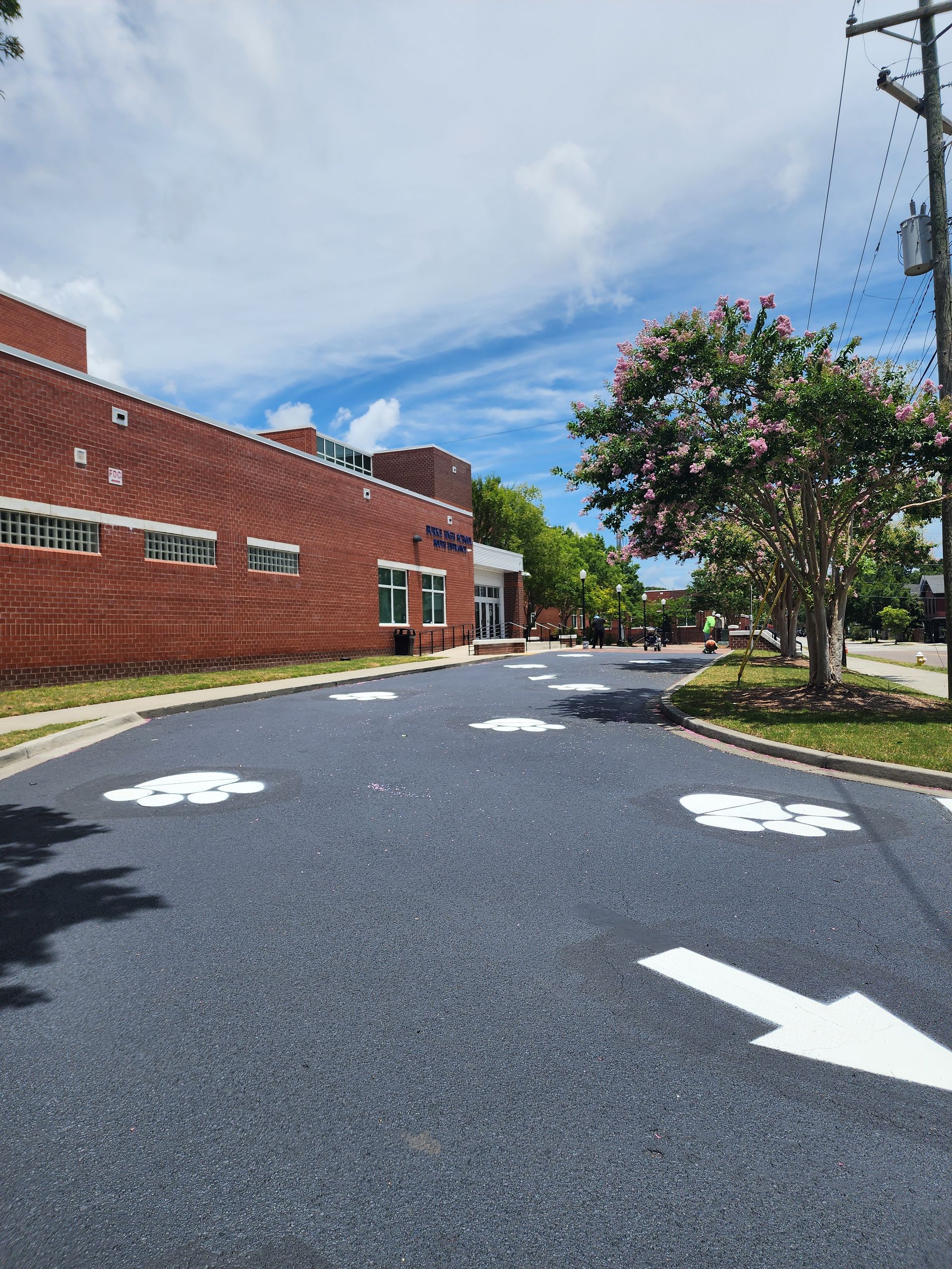 Freshly paved driveways and parking areas at a North Charleston school – ABC Paving project.