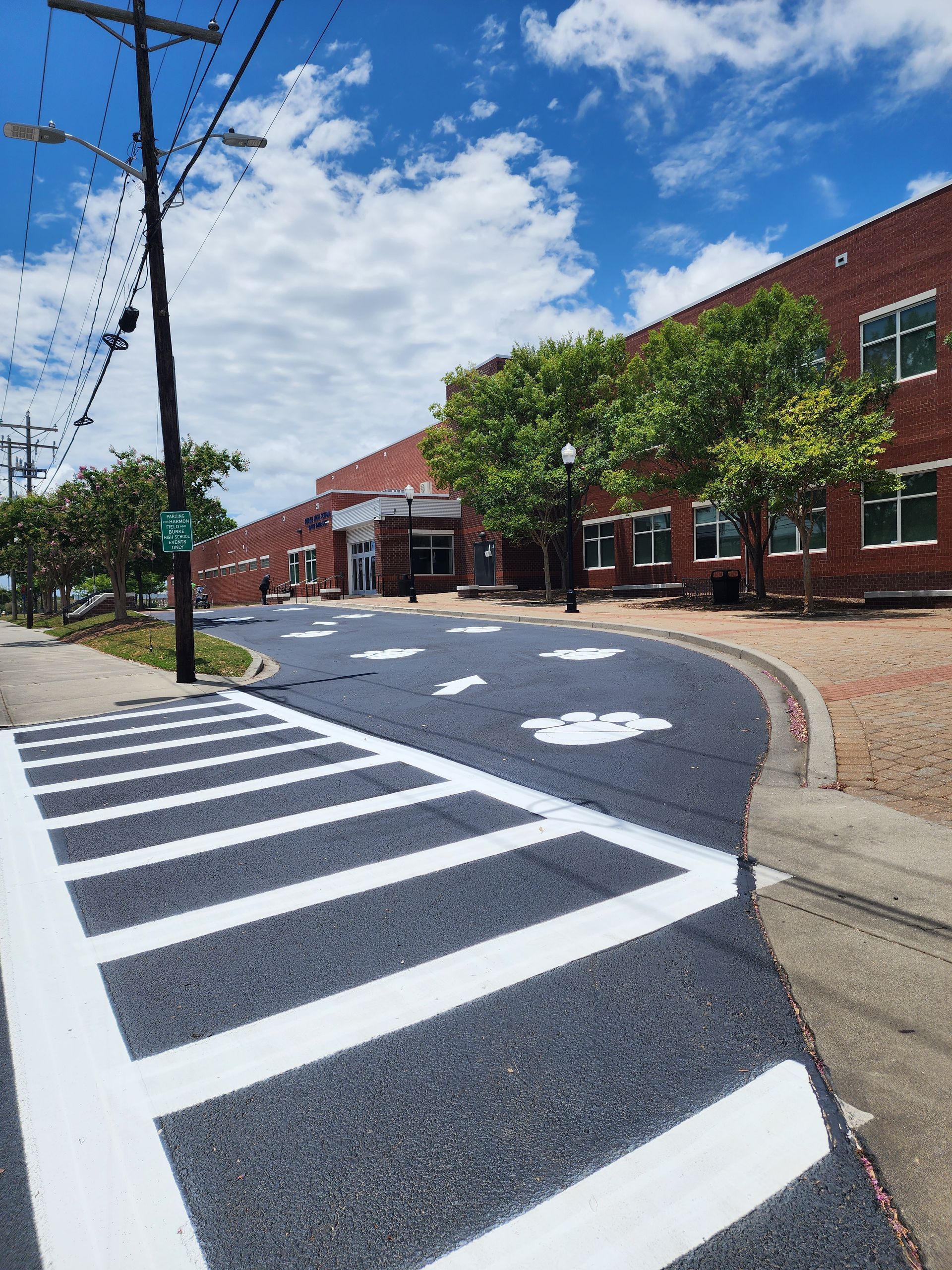 ABC Paving completed driveway and parking lot asphalt paving at a Charleston, SC school.