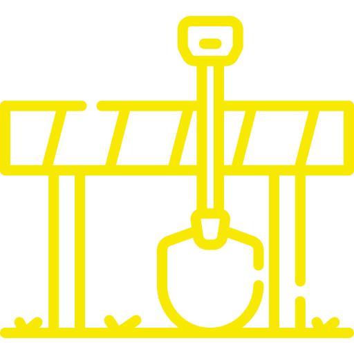 A yellow icon of a construction site with a shovel.