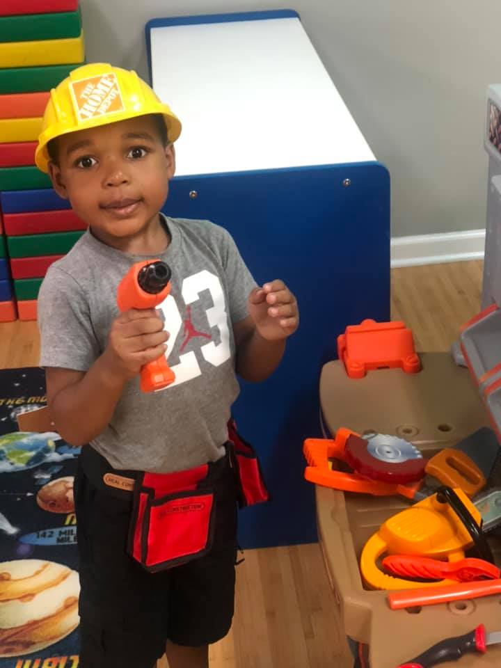 Toddler Playing Lego — Hammond, IN — Kidzville Daycare Center LLC.