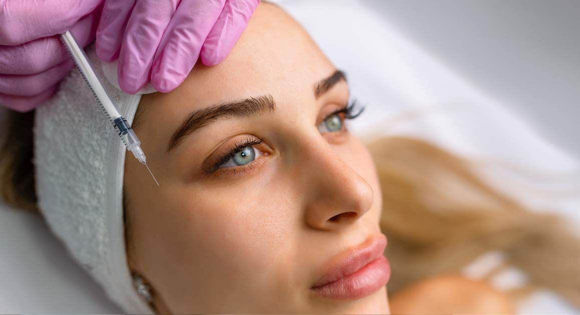 A woman is getting Botox Treatments NJ and NYC at Victory Medical Institute