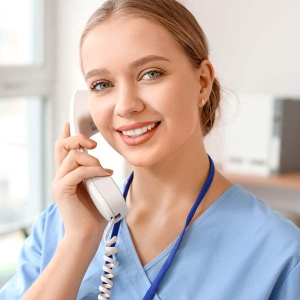 Receptionist receiving Contact Victory Medical Institute for a Blood Disorder Therapy Consultation call