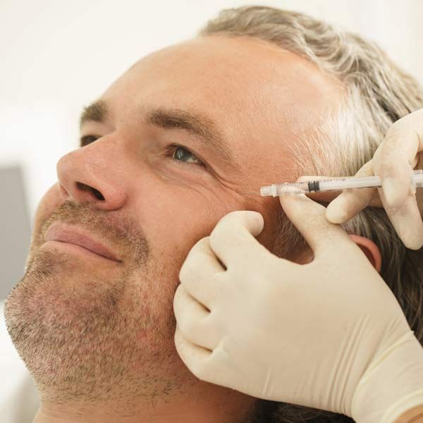 A man is Reclaiming his Youthful Confidence with Orthobiologic Dermal Filler Treatments Serving Patients in Morris Plains New Jersey and Manhattan New York