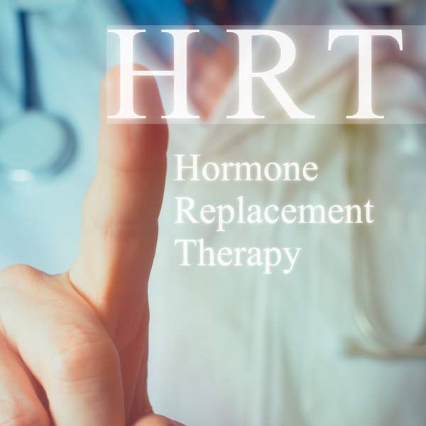 A person is pointing at the word hrt hormone replacement therapy